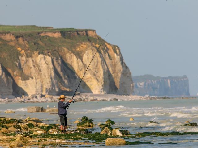 Fisherman at the water's edge